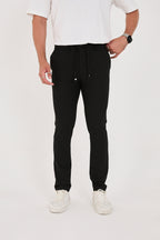 Erkek Gofre Kumaş Likralı Jogger Slim Fit Pantolon - Siyah